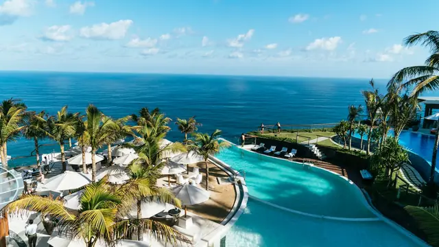 Resort infinity pool overlooking the sea