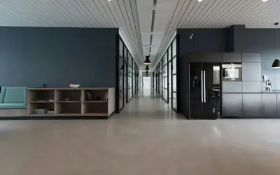 Modern office corridor with glass walls